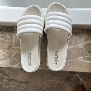 Platform Muk Luks worn once to small for me size 8